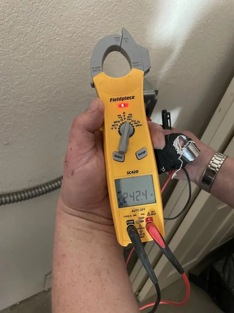Voltage testing with clamp meter during Aluminum Wiring Replacement in Collegedale